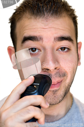 Image of Young Man Shaving