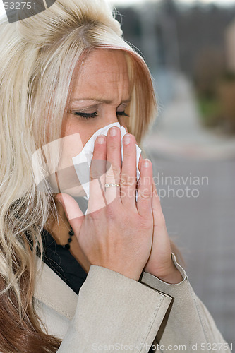 Image of Blowing Her Nose