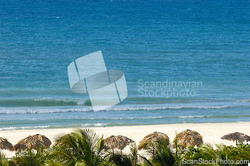 Image of Beach with parasols and sunbeds