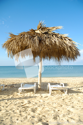 Image of Parasol on exotic beach