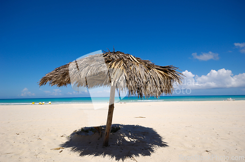 Image of Parasol on exotic beach