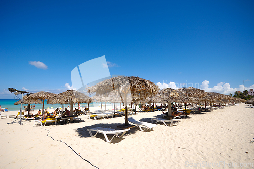 Image of Beach with parasols and sunbeds