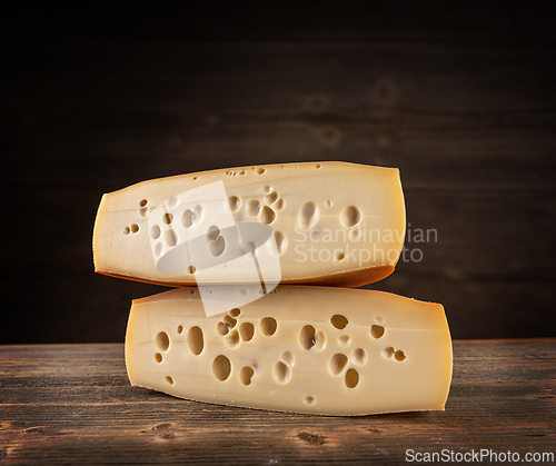 Image of Two pieces of swiss cheese