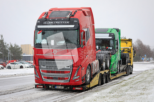 Image of Transporting Volvo Trucks in Winter