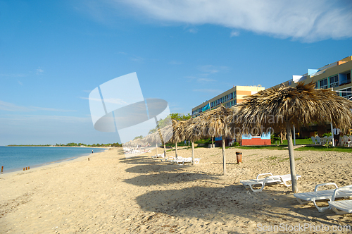Image of Beach with parasols and sunbeds
