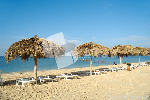 Image of Beach with parasols and sunbeds