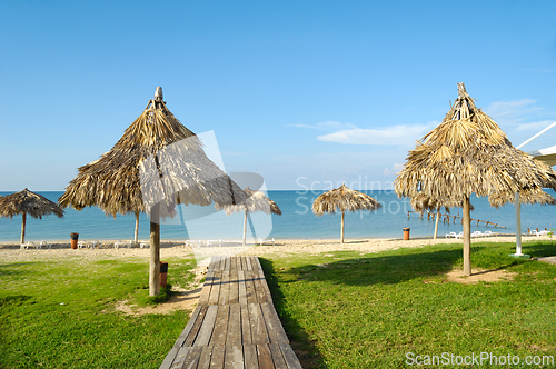 Image of Beach with parasols and sunbeds