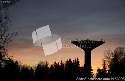 Image of A watertower at night