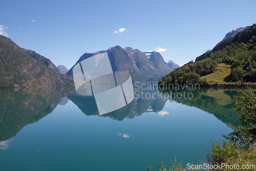 Image of Oppstrynvatnet between high mountains