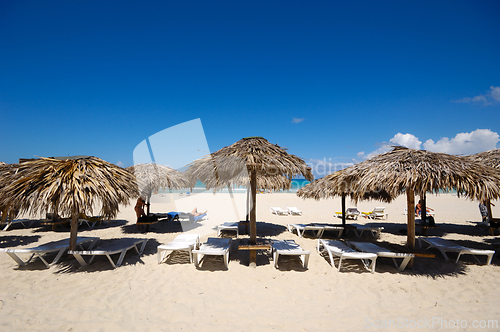 Image of Beach with parasols and sunbeds
