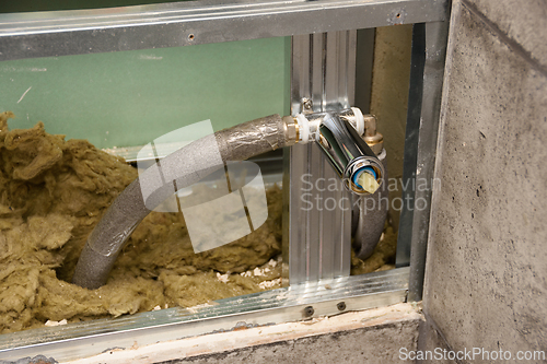 Image of Installation of hidden communications for connecting a hygienic shower