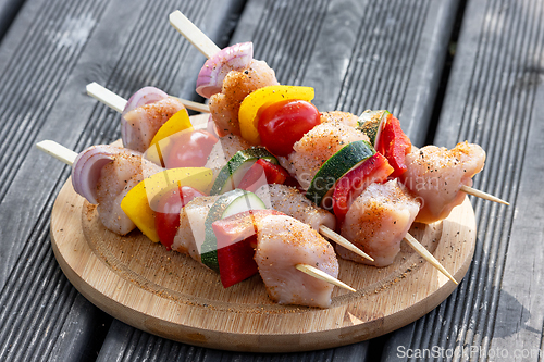 Image of chicken meat and vegetable skewers