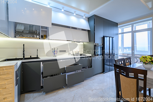 Image of Luxury white and dark grey modern kitchen interior