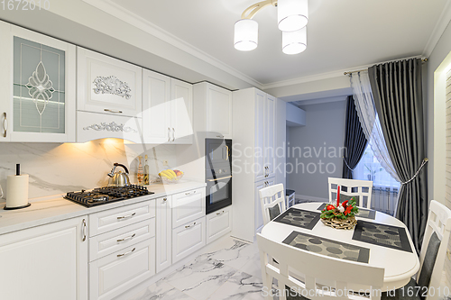 Image of White kitchen in classic style
