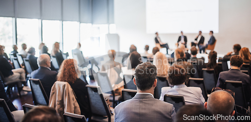 Image of Interview and round table discussion at business convention and presentation. Audience at the conference hall. Business and entrepreneurship symposium