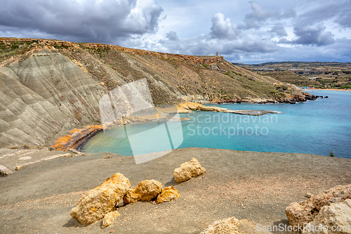 Image of Ghajn Tuffieha Bay and Qarraba Bay with red sand. Malta