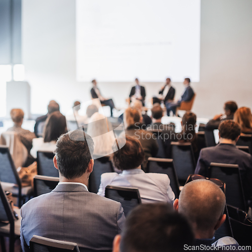 Image of Interview and round table discussion at business convention and presentation. Audience at the conference hall. Business and entrepreneurship symposium