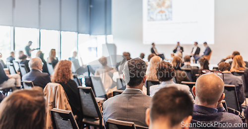 Image of Interview and round table discussion at business convention and presentation. Audience at the conference hall. Business and entrepreneurship symposium