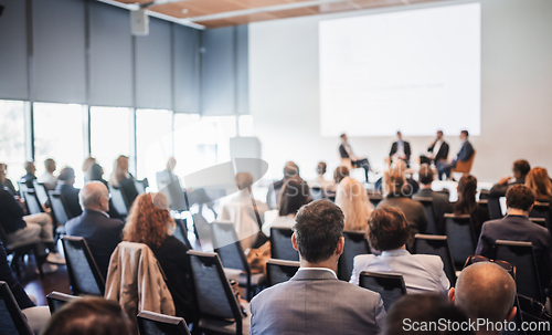 Image of Interview and round table discussion at business convention and presentation. Audience at the conference hall. Business and entrepreneurship symposium
