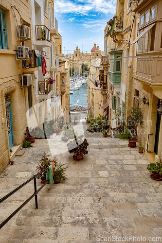 Image of One of the small historic hidden streets in ancient city Valletta, Malta