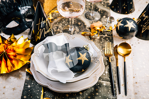 Image of Elegant place setting for Christmas, New Years Eve, glasses of sparkling wine