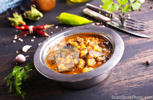 Image of Vegetable stew. in metal bowl. Hot foodstuff.