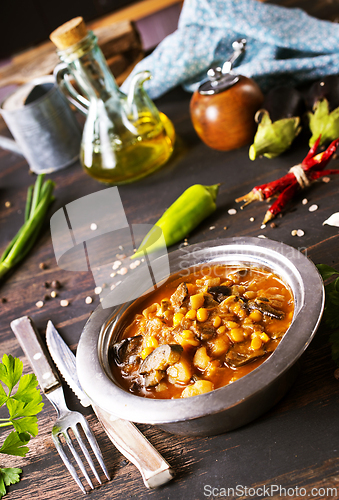 Image of Vegetable stew. in metal bowl. Hot foodstuff.