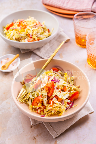 Image of Healthy cabbage salad with tomatoes, homemade winter salad