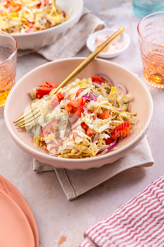 Image of Healthy cabbage salad with tomatoes, homemade winter salad