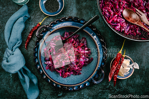 Image of Homemade pickled red cabbage with chili, garlic and sesame seeds