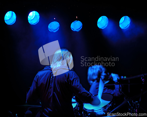 Image of Drummer and blue light