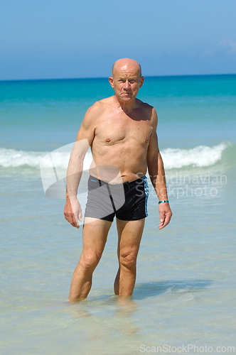 Image of Senior man in water