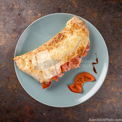 Image of Closed pizza, or calzone,