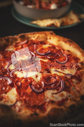Image of Delicious pizza with pepperoni