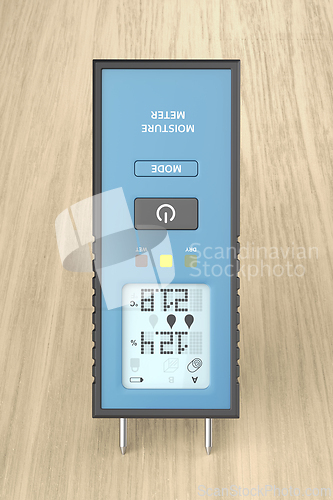Image of Measuring humidity of wood with moisture meter
