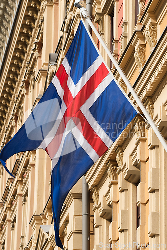Image of The flag of Iceland on a building
