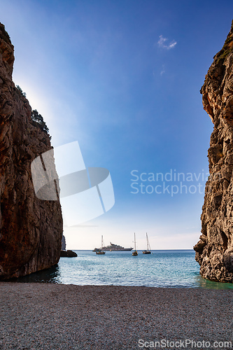 Image of Pleasure boats stranded in the cove, Sa Calobra