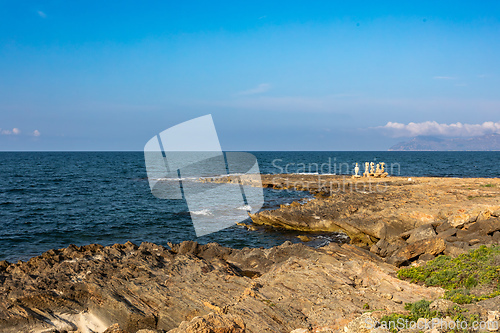 Image of Group of sculptures, statues of people on beach in Can Picafort. Can Picafort, Balearic Islands Mallorca Spain.