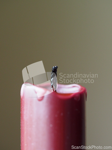 Image of Red candle with a wick