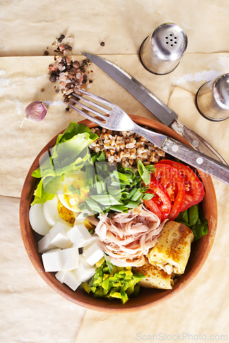 Image of Delicious healthy breakfasts, buckwheat with boiled egg and meat and cheese