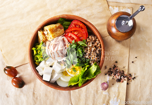Image of Delicious healthy breakfasts, buckwheat with boiled egg and meat and cheese