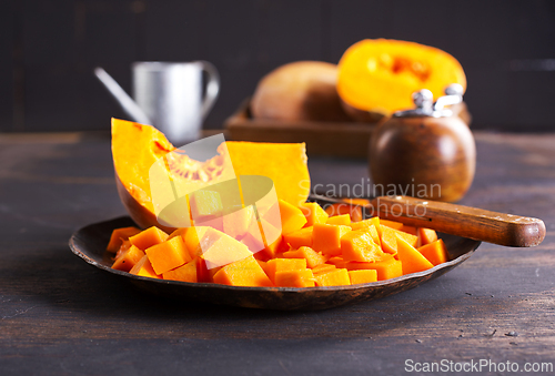 Image of Autumn pumpkin on dark background