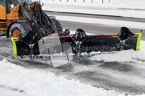 Image of Loader Mounted Snowplow Working