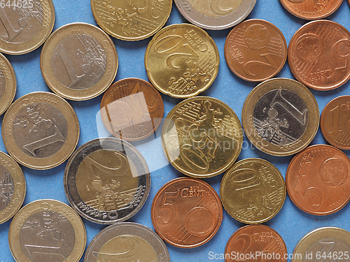 Image of Euro coins, European Union over blue