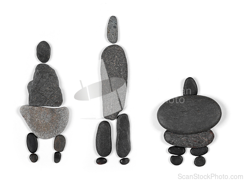 Image of Different silhouettes of human figures are made of gray stones