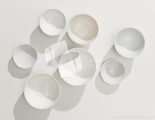 Image of various white empty bowls