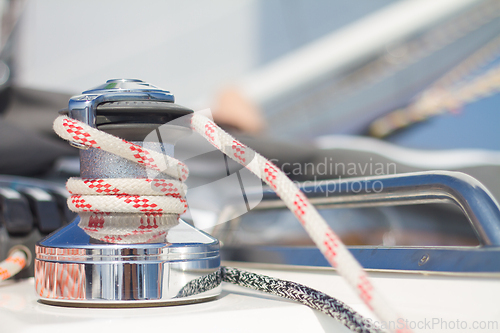 Image of Winch with rope on sailing boat.