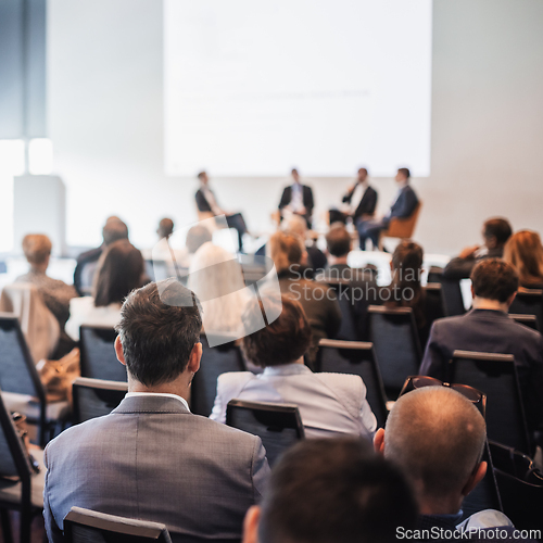 Image of Interview and round table discussion at business convention and presentation. Audience at the conference hall. Business and entrepreneurship symposium