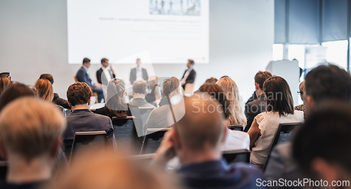 Image of Interview and round table discussion at business convention and presentation. Audience at the conference hall. Business and entrepreneurship symposium