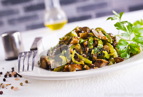 Image of Eggplants with green tomatoes, paprika, carrot, onion and garlic.